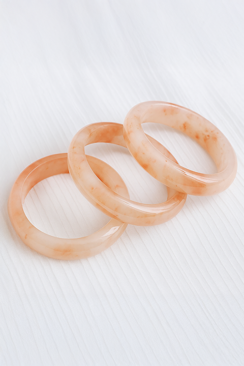 Natural Golden Silk Jade Bangle in Peach Glow